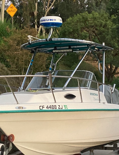 Key West boat with installed Atlantic Towers Top and Furuno radar dome mounted above the canopy on a trailer.