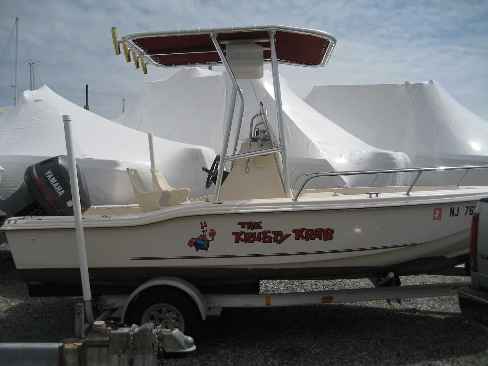 Atlantic Towers T-Top installed on a Scout 17 center console boat with blue water background.