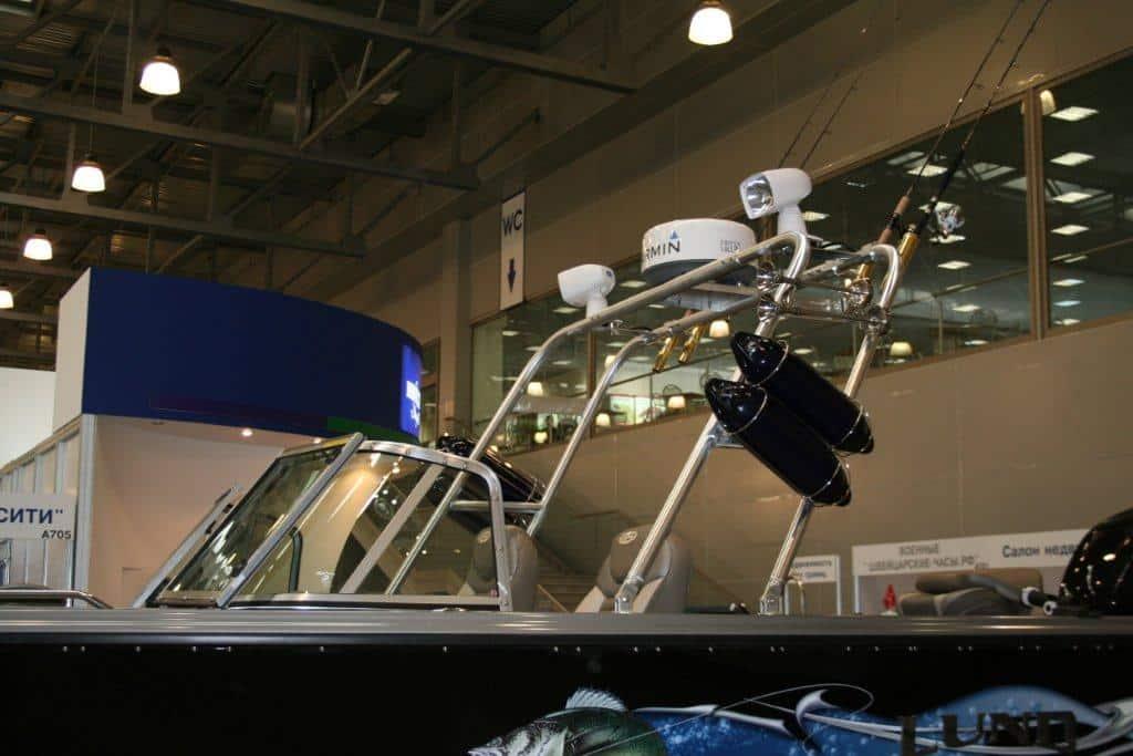 Atlantic Towers T-Top mounted on a boat, featuring fishing rods, lights, and a Garmin device.