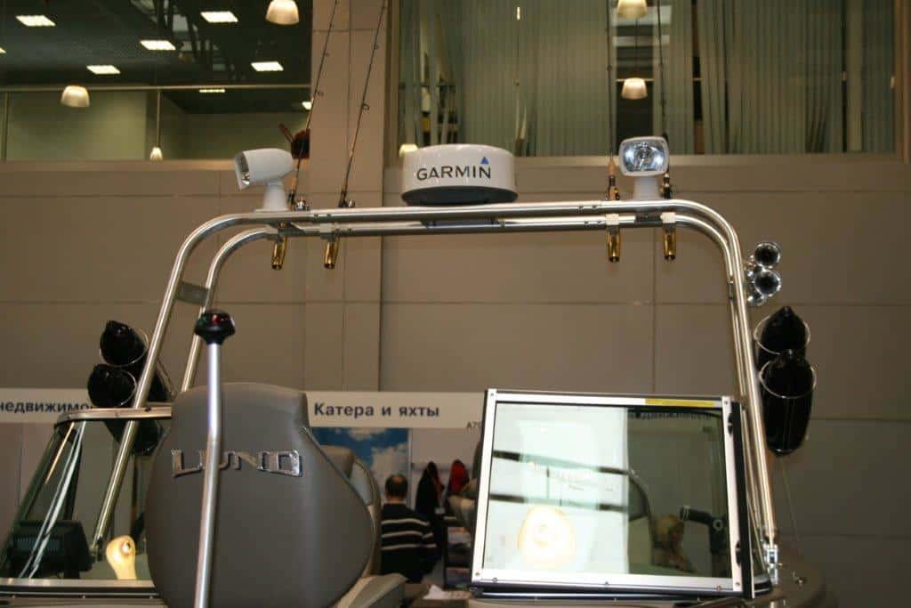 Atlantic Towers T-Top installed on a boat, featuring fishing rods, lights, and a Garmin device on top.