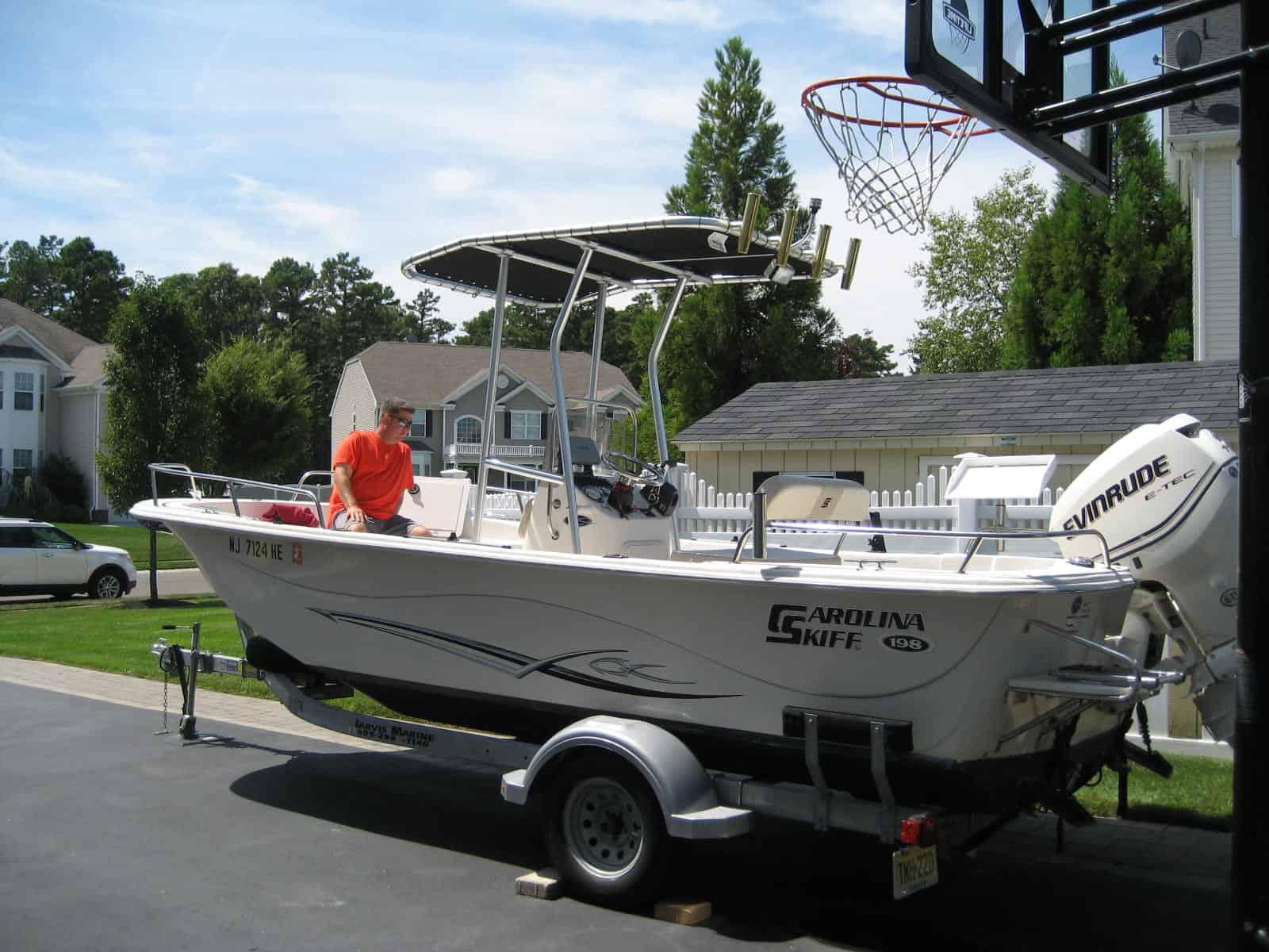 Atlantic Towers T-Top installed on a Carolina Skiff 198 DLV center console boat shown from the side