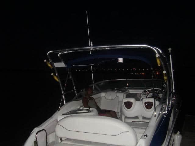 Atlantic Towers Arch installed on a Crownline 270 BR dual console boat shown docked on the water.