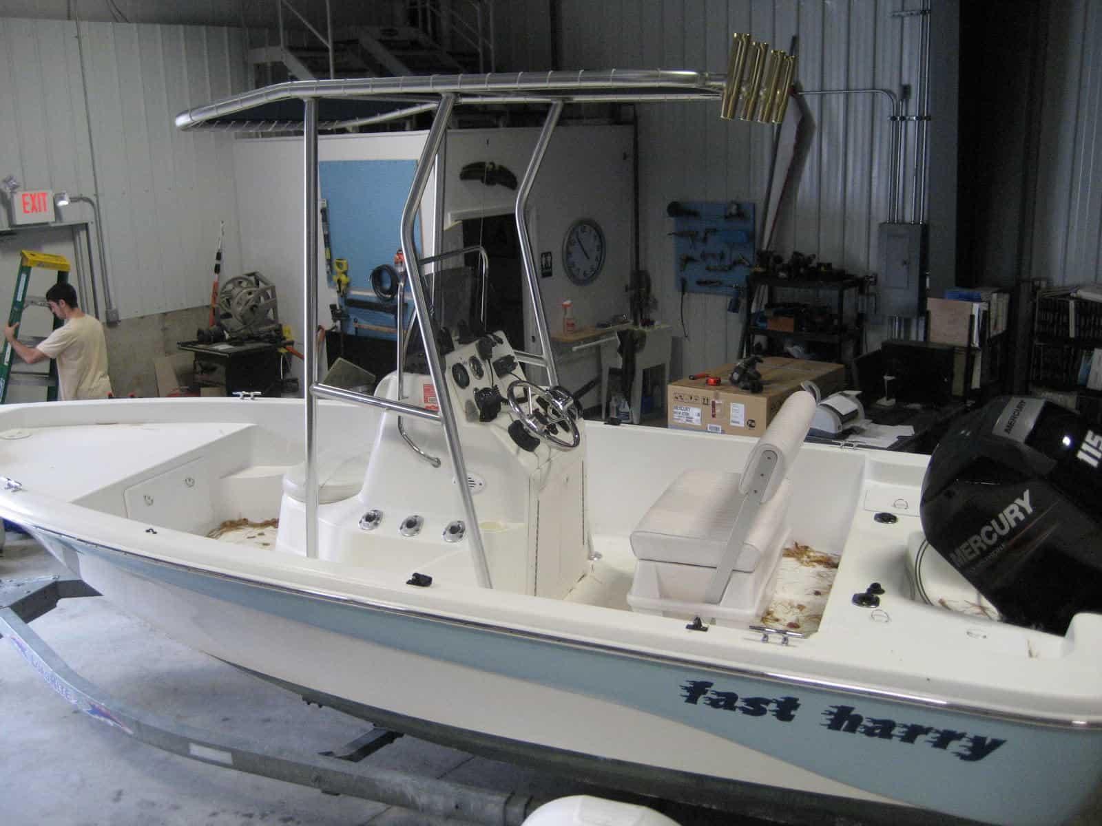 Atlantic Towers T-Top installed on a Nautic Bay 1800 center console boat shown in clear water on a sunny day