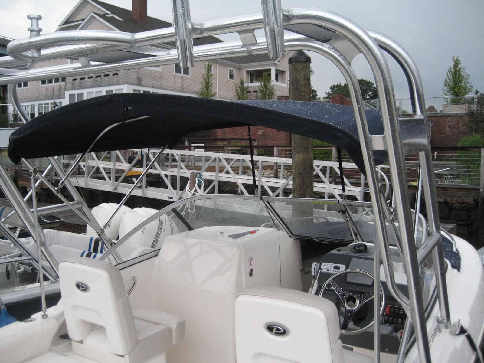 Atlantic Towers Arch installed on a Pursuit 235 dual console boat shown from the side on water.