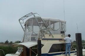 Atlantic Towers arch on a Chris Craft 360 Commander convertible boat, showcasing a sleek and functional design.