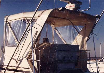 Atlantic Towers Arch installed on a Blackfin 32 Sportfisherman sportfisher boat shown from the side on water.