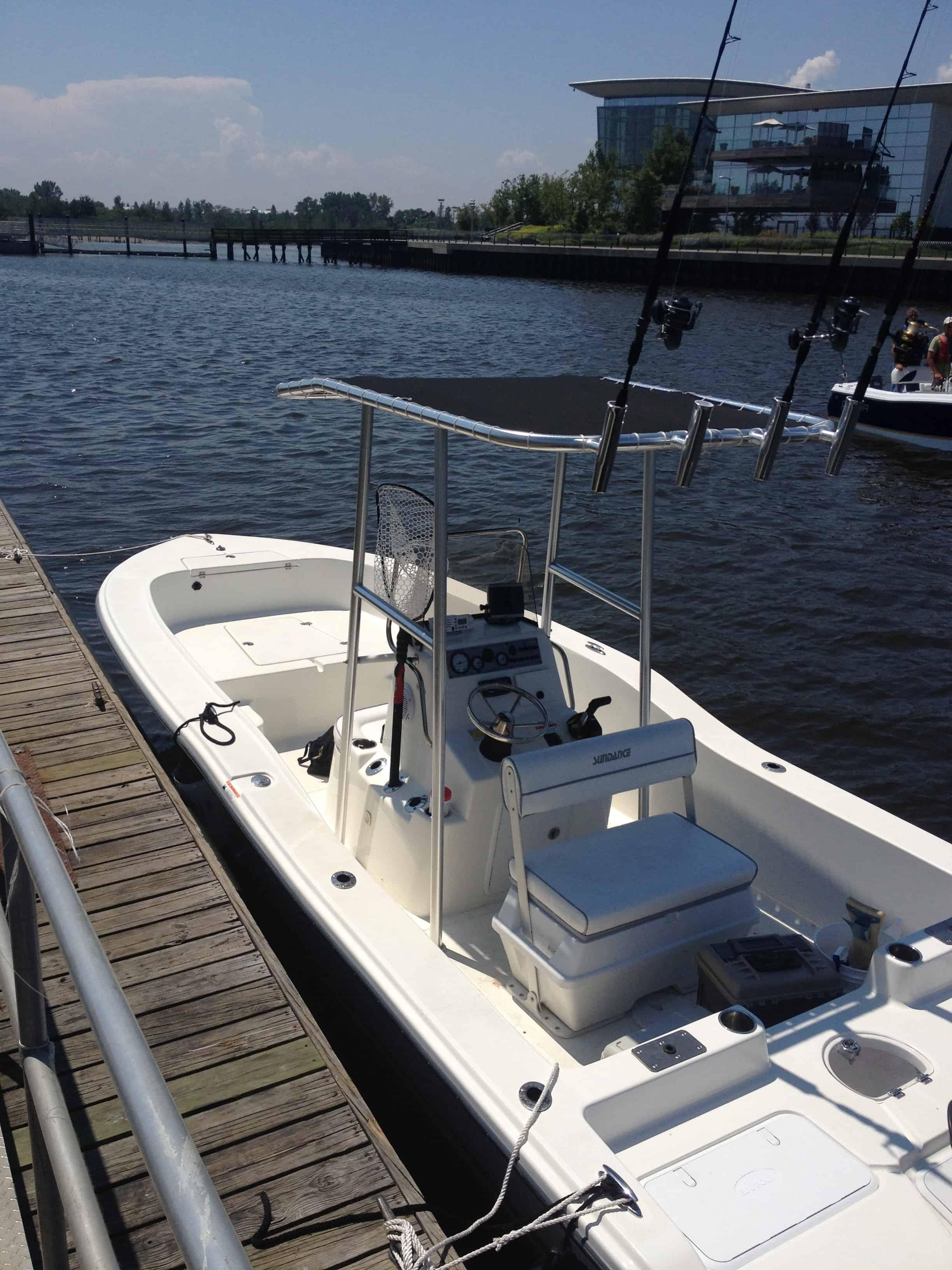 Atlantic Towers T-Top on a Boston Whaler 220 Dauntless center console boat, providing shade and storage.