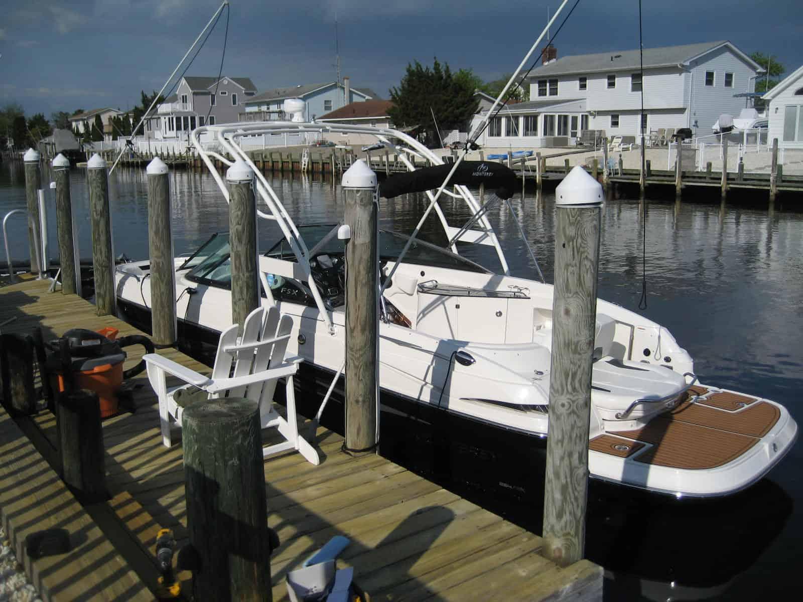 Atlantic Towers arch on a Monterey 264 Fsx bow rider, showcasing sleek design and functional elegance.