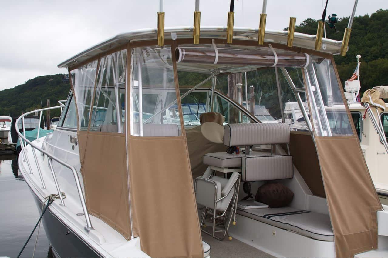 Atlantic Towers Top installed on a Mainship 30 Pilot cruiser boat, showing the arch on the deck.