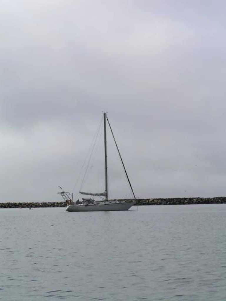Atlantic Towers Arch installed on an Islander 36 sailboat with rigging and deck equipment visible.
