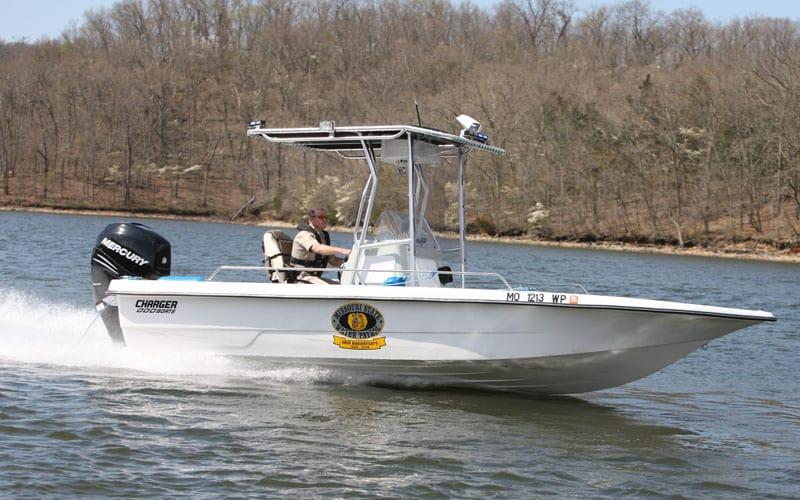 Atlantic Towers T-Top installed on a Charger 22 center console boat, showcasing a sturdy frame and functional design.