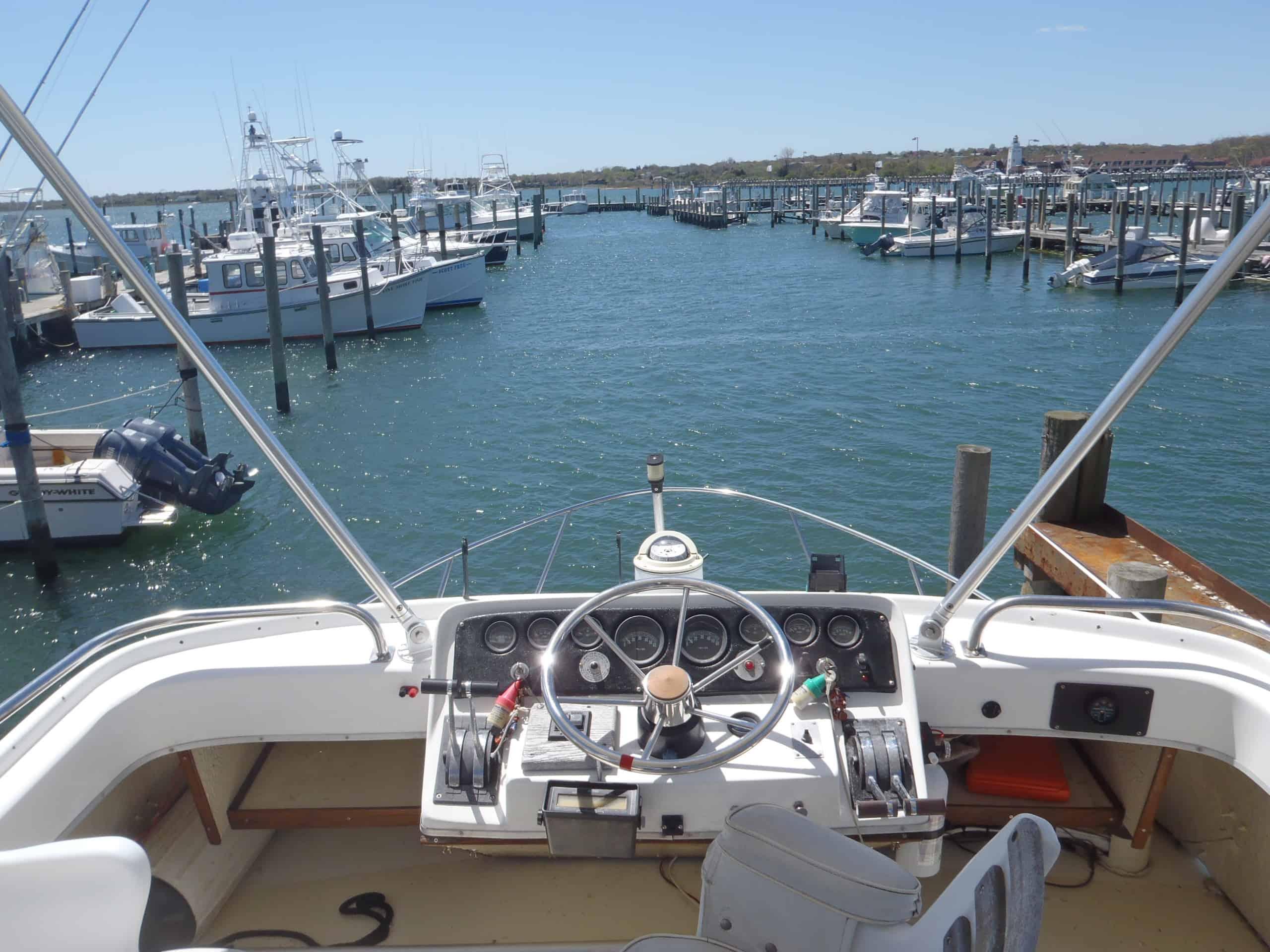 Atlantic Towers Top installed on a Silverton 31 Convertible boat, showcasing its sleek design and functionality.