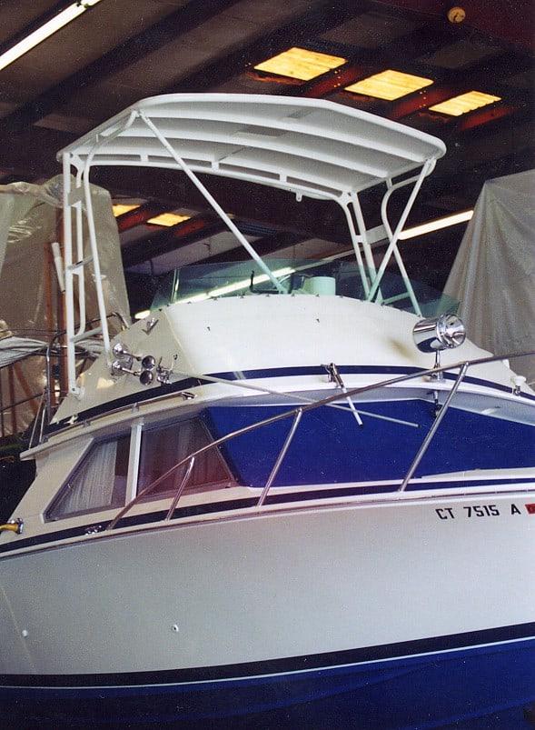 Atlantic Towers Top mounted on a Bertram boat, showcasing its sleek design and construction within a marine environment.