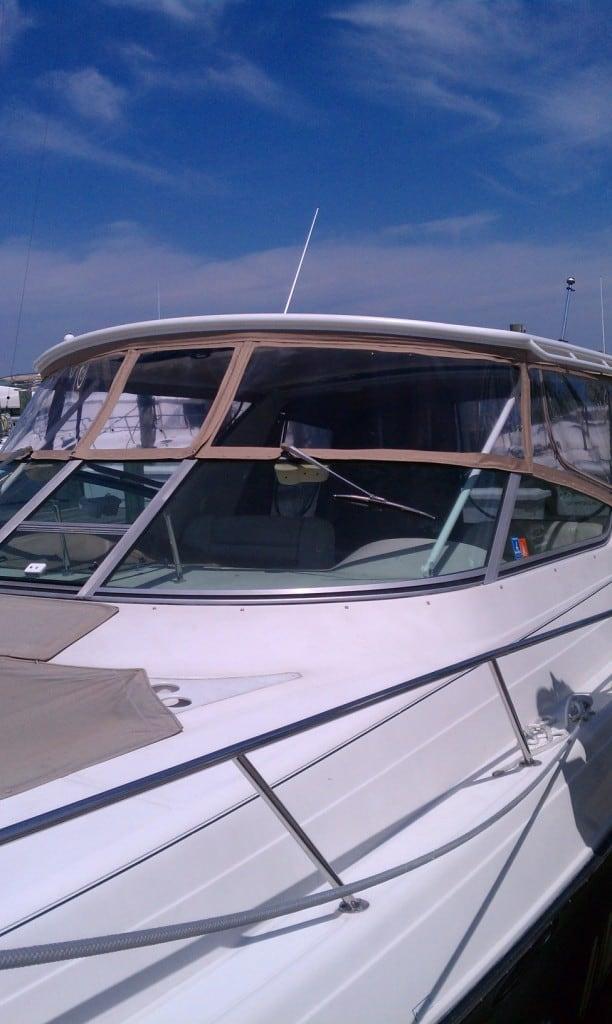 Atlantic Towers Top installed on Regal 380/400/402 Commodore express boat with calm water and clear sky background