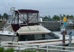 Atlantic Towers Arch installed on a Silverton 37C convertible boat, showing framework and mounted equipment.