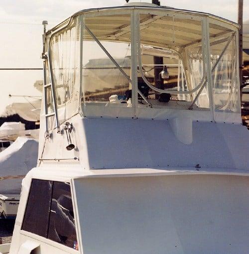 Atlantic Towers Top installed on the upper deck of a Hattaras 34 boat docked by the marina