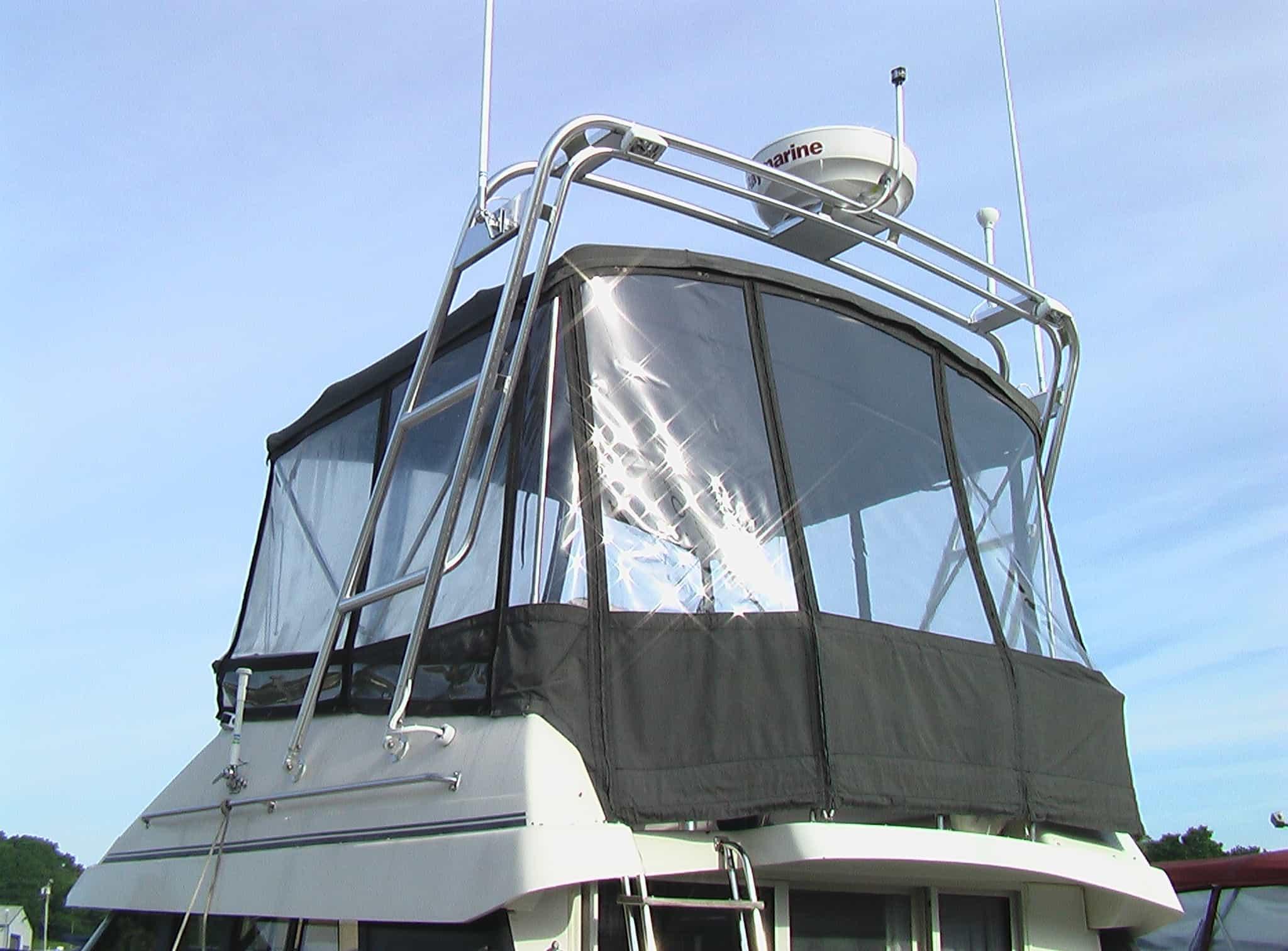 Atlantic Towers arch installed on a Silverton 34C convertible boat, showcasing its sleek design and functionality.