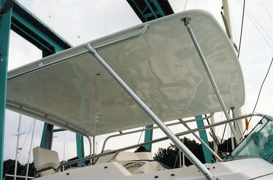 Atlantic Towers Top installed on a Bertram 446 Convertible boat, showcasing its sleek design and support structure.
