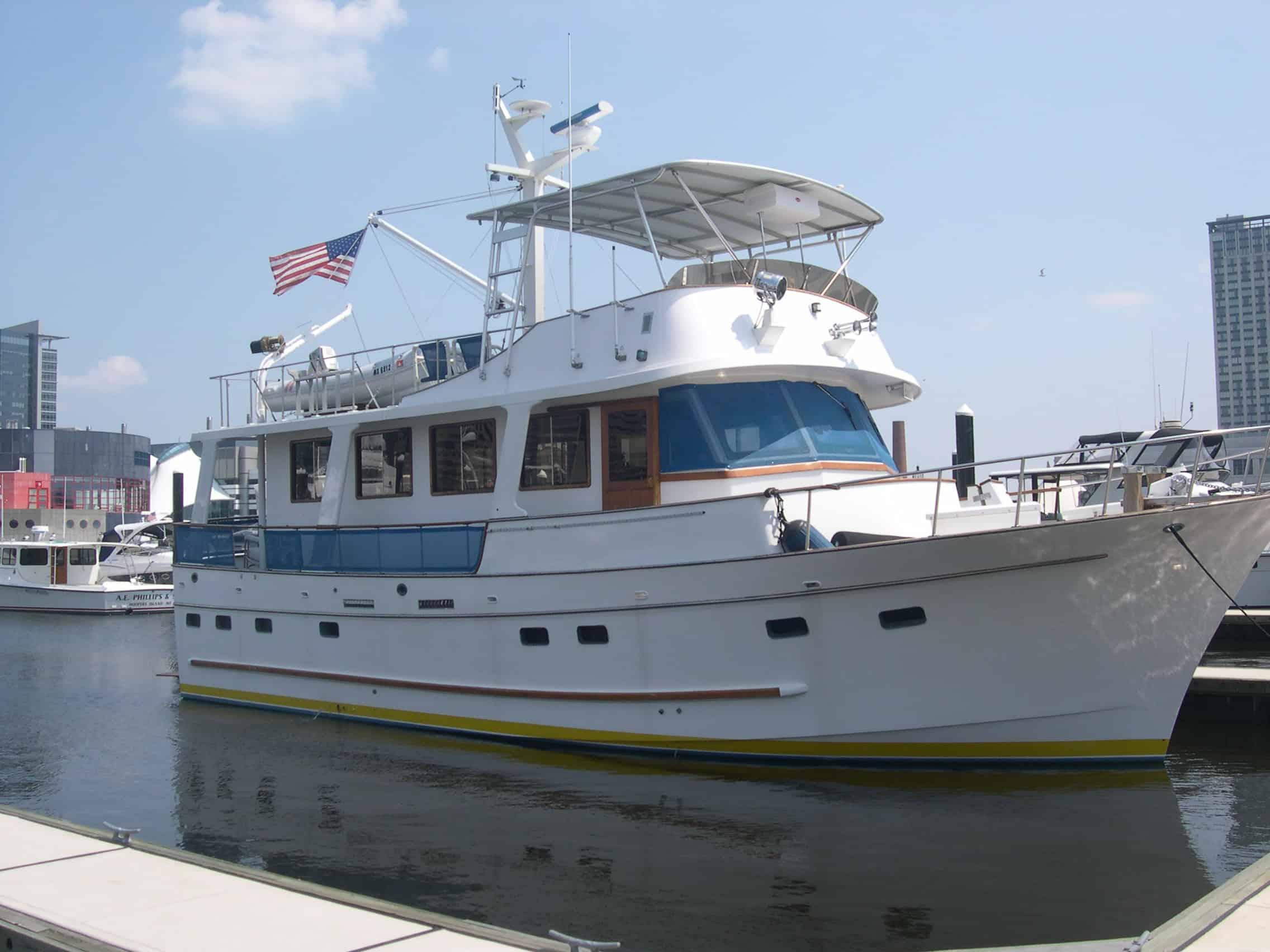 Atlantic Towers Top installed on Marine Trader 50 Motor Yacht trawler on water under clear sky.