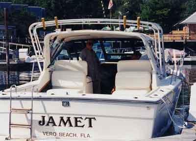 Atlantic Towers Arch installed on a Tiara 3100 Open cruiser boat, shown against a clear sky background.