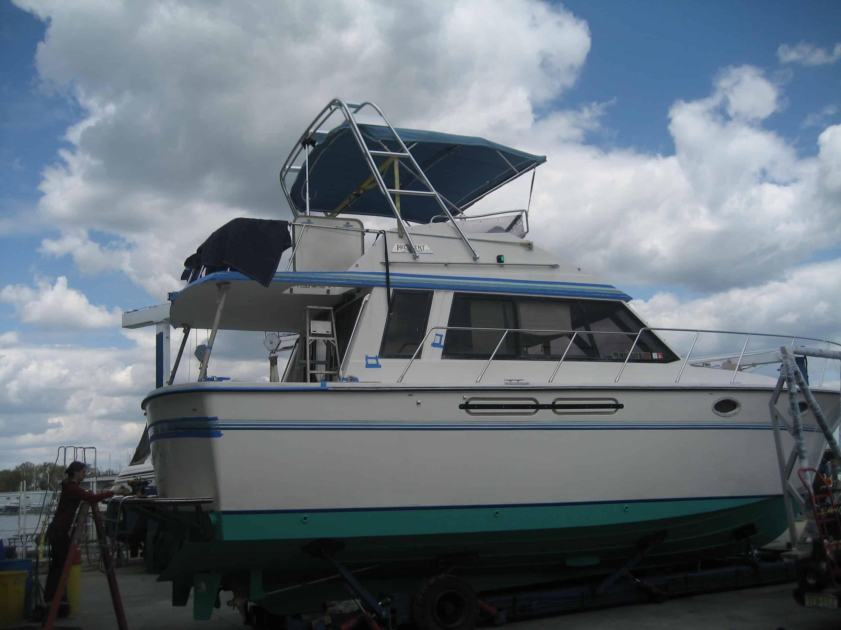 Atlantic Towers Arch installed on a boat with a blue and white color scheme, under a partly cloudy sky.