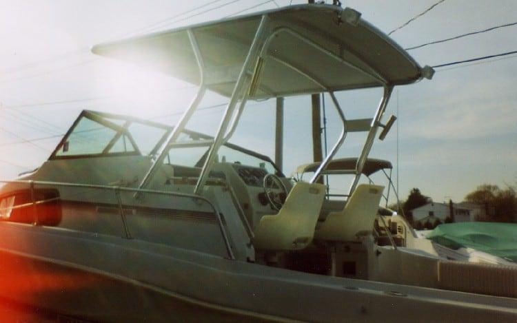 Renken 2688 boat with white Atlantic Towers Top frame and canopy mounted above the cockpit area