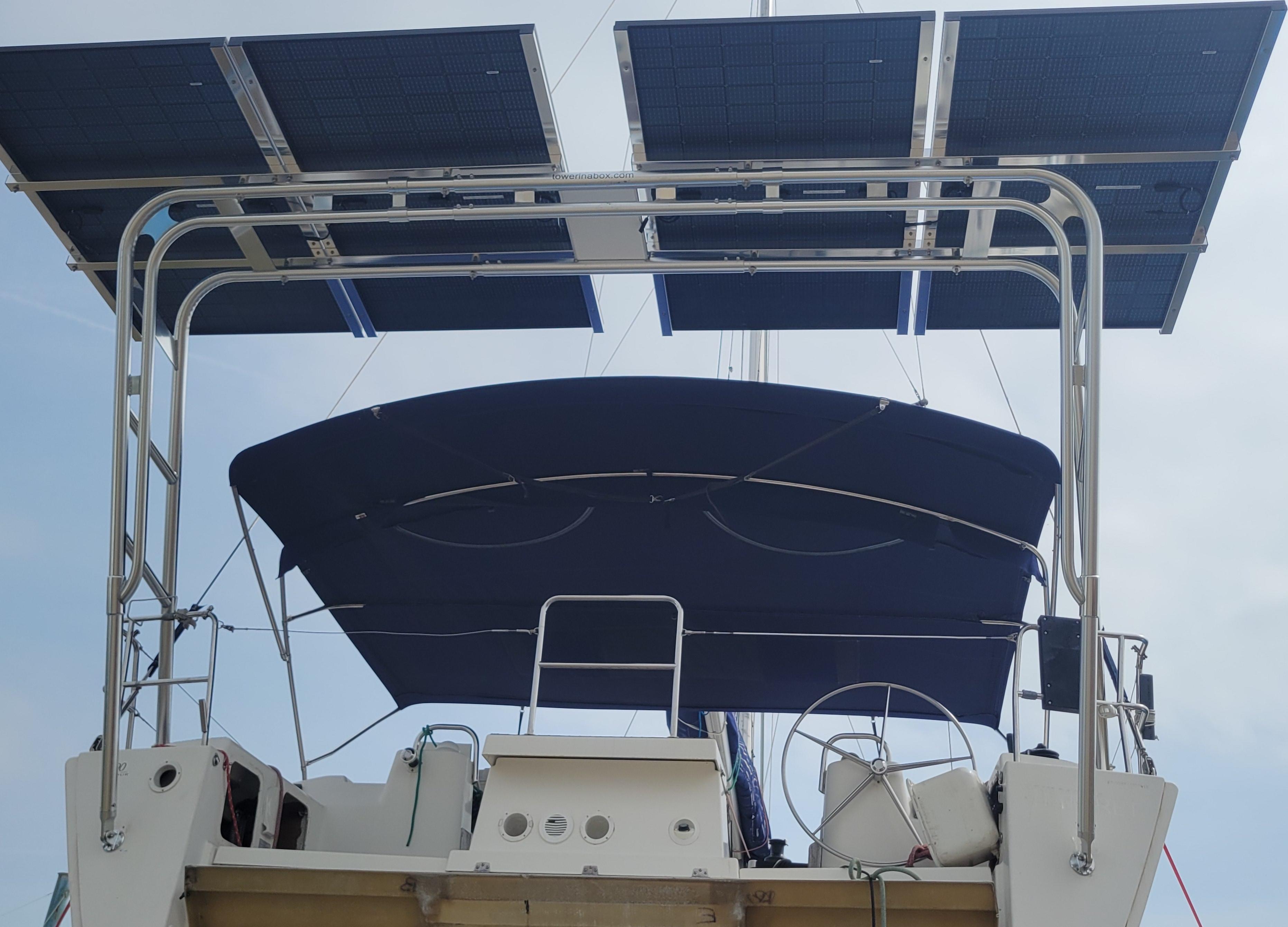 Atlantic Towers Arch mounted on the stern of a Dufour Yachts boat, supporting solar panels above the cockpit.
