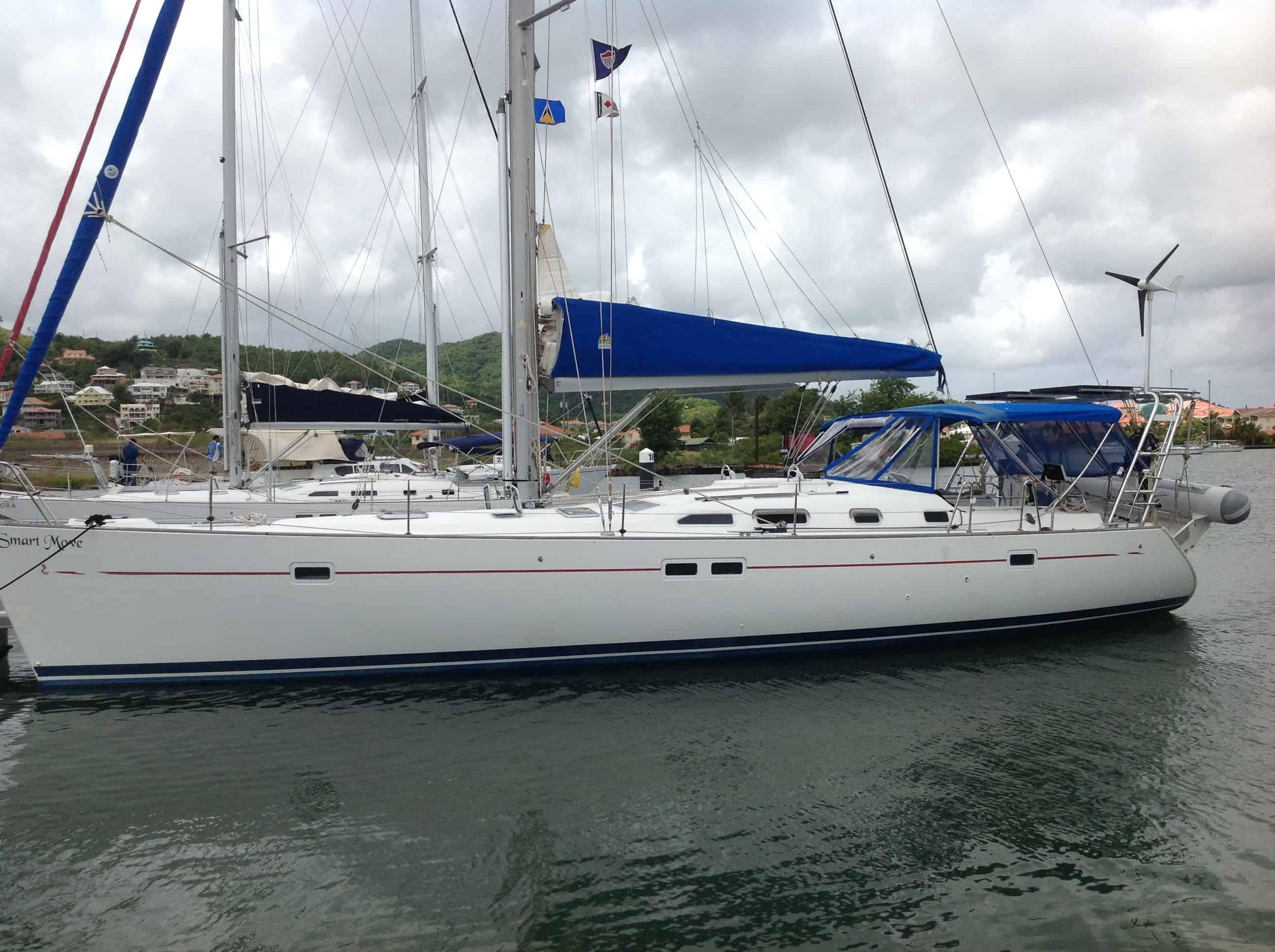 Atlantic Towers arch installed on a Beneteau 473 sailboat in a marina setting.