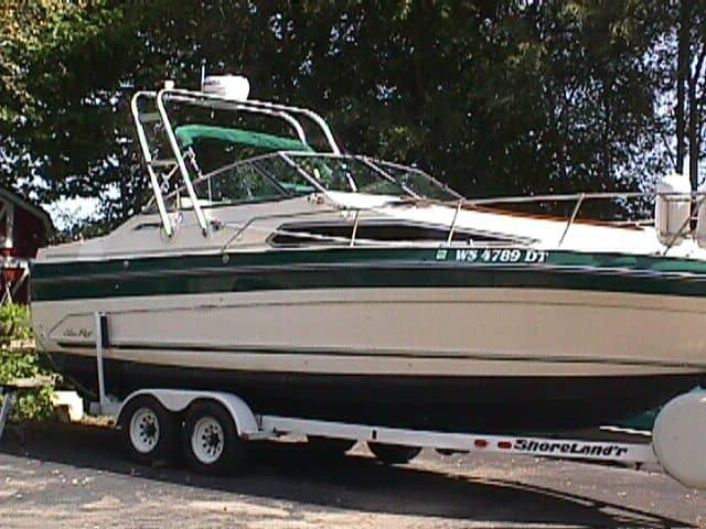 Atlantic Towers arch installed on a Sea Ray 268 Sundancer boat, parked on a trailer in an outdoor setting.