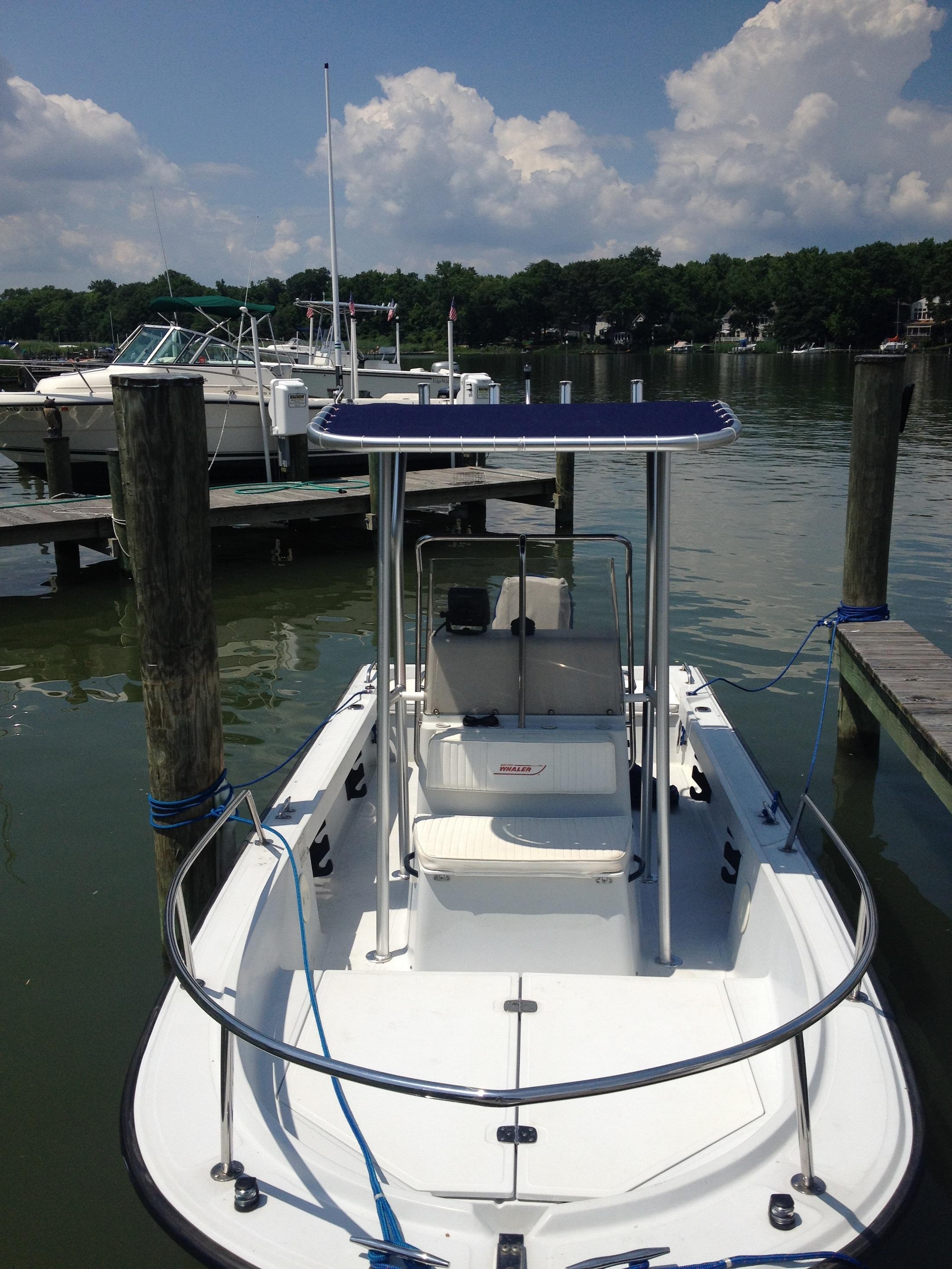 Atlantic Towers T-Top on a Boston Whaler 19 Outrage center console boat, showcasing its sleek design and functionality.