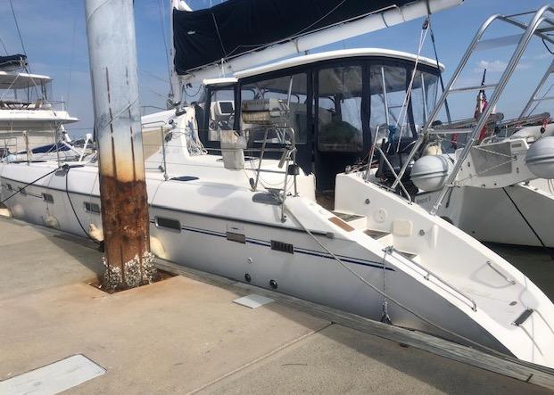 Atlantic Towers Arch installed on a Privilege boat at the dock, showcasing its sleek design and functionality.