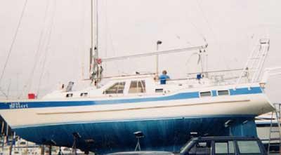 Atlantic Towers Arch installed on a Wauquiez Amphitrite sailboat, displayed in a boat yard.