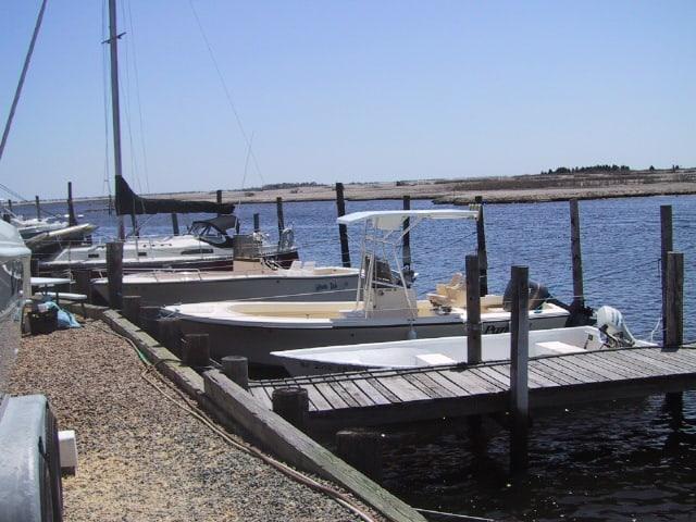 Atlantic Towers T-Top installed on a Parker 21 center console boat, providing shade and support for fishing activities.