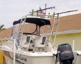 Atlantic Towers Arch installed on a Pro Line 240 walk boat, featuring fishing rod holders and a canopy.