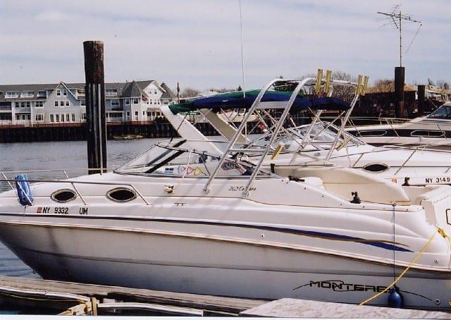 Atlantic Towers Arch installed on a Monterey 262 boat docked near a waterfront.