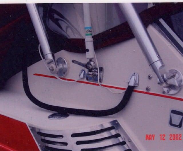 Atlantic Towers arch on a Wellcraft 3200 St. Tropez express cruiser, showcasing a sleek and modern design.