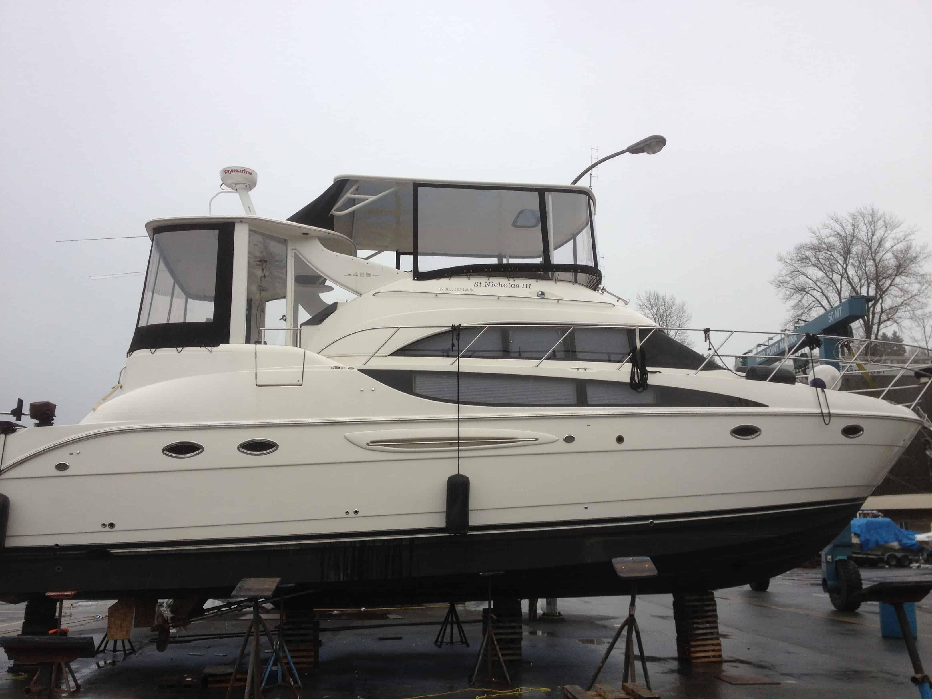 Atlantic Towers Top installed on a Meridian 459 Cockpit MY motor yacht, showing the helm and seating area.