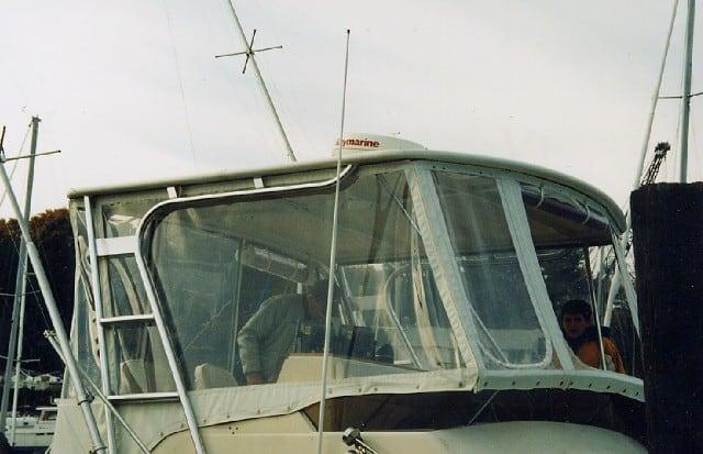 Atlantic Towers Top installed on a Chris Craft 36 Commander boat, showing the windshield and cabin area.