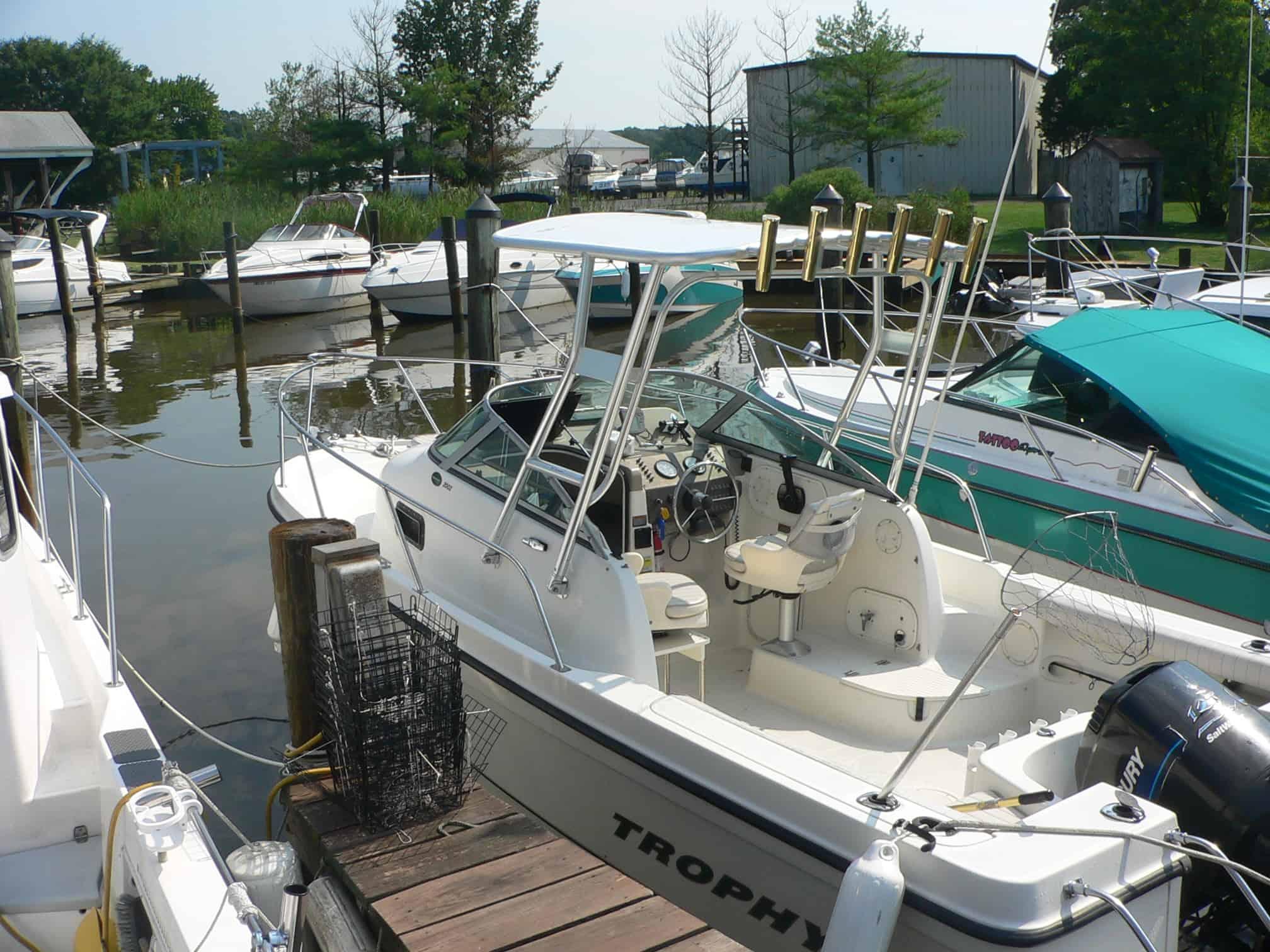 Atlantic Towers Top installed on a Trophy 2002 walkaround boat showing stainless steel frame and canvas top.