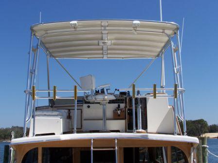 Atlantic Towers Top installed on a Jersey 48 Jersey Dawn, featuring a spacious helm area and canopy.