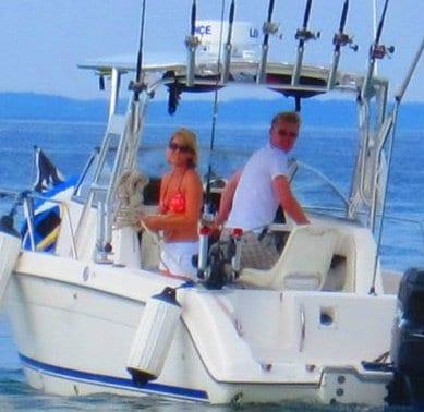 Atlantic Towers Top installed on a Wellcraft 238/240 Coastal w/a boat shown from the side on the water.