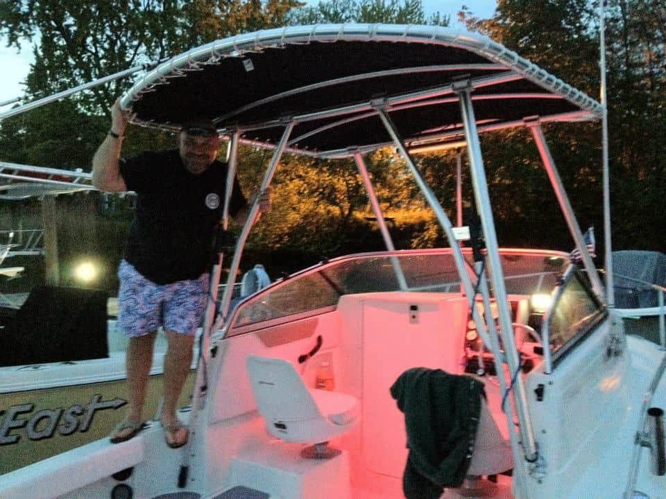 Atlantic Towers Top installed on Seaswirl 2101 Striper walkaround boat with blue sky background
