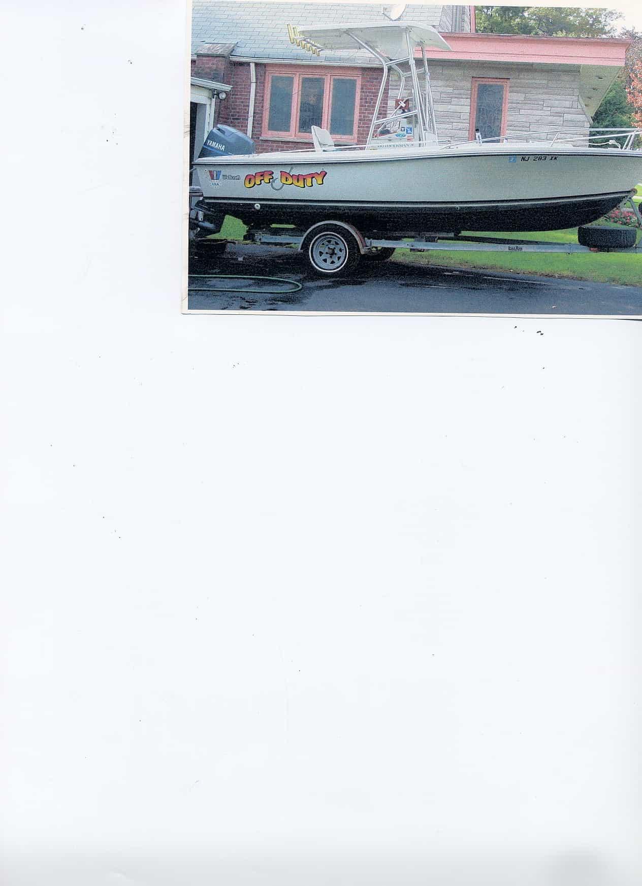 Atlantic Towers T-Top installed on a Wellcraft 18 Fisherman center console boat showing side view with outboard motor
