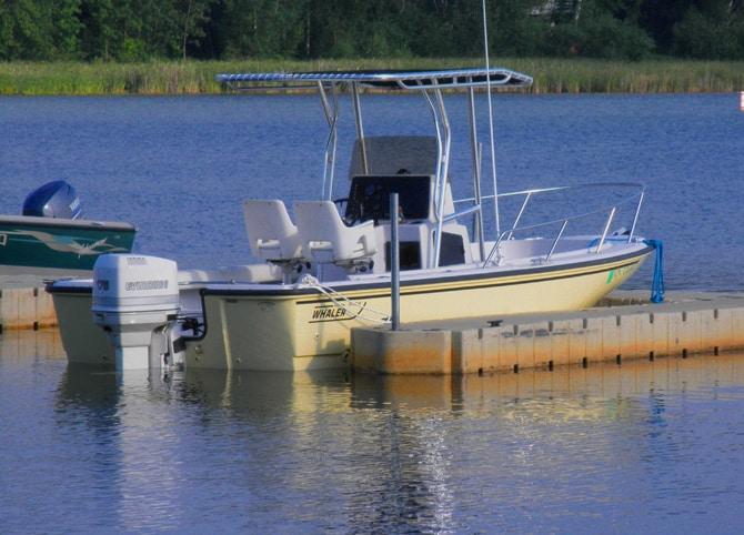 Atlantic Towers T-Top installed on a Boston Whaler 19/20 Outrage center console boat shown from the side.