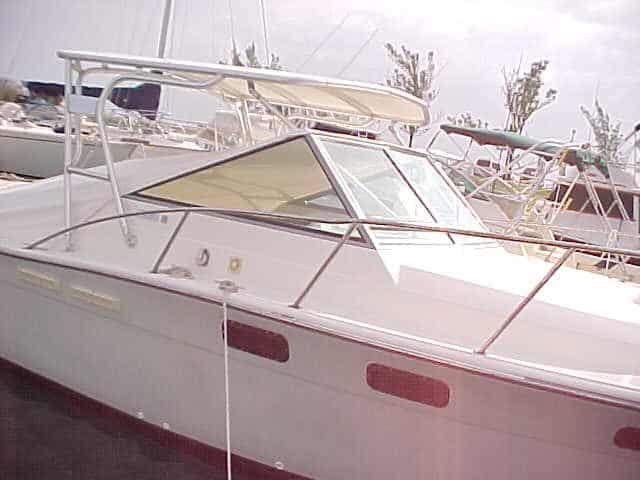 Atlantic Towers Top installed on a Tiara 27 Open boat, showcasing its sleek white design and windshield.