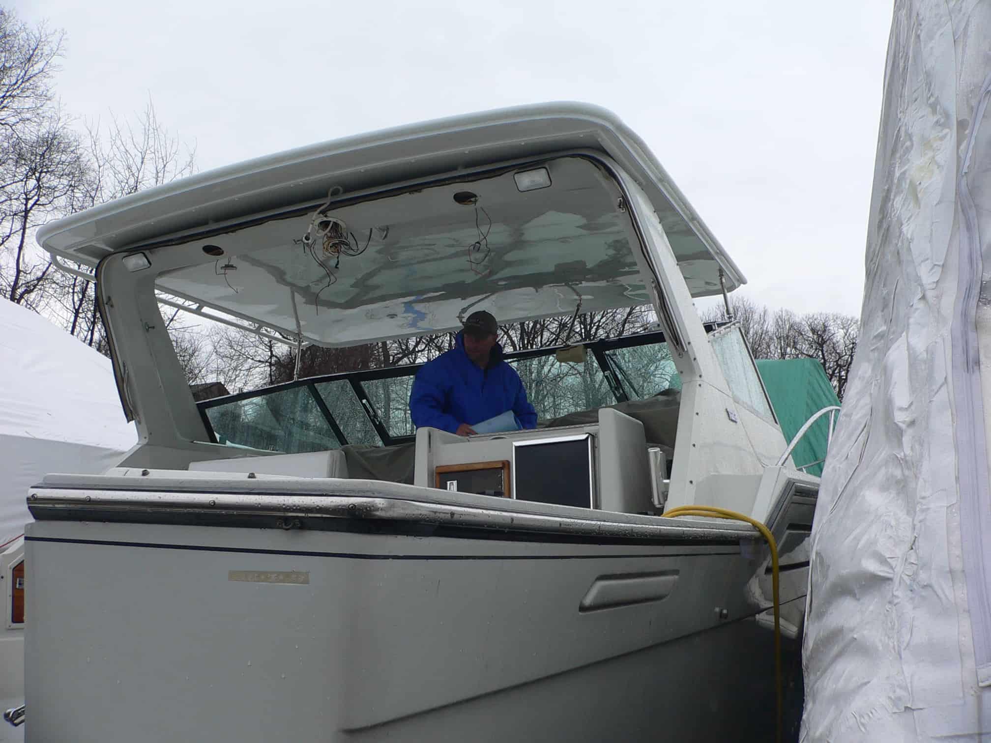 Atlantic Towers Top installed on a Tiara 3600 Open express boat, shown from the side on calm water.