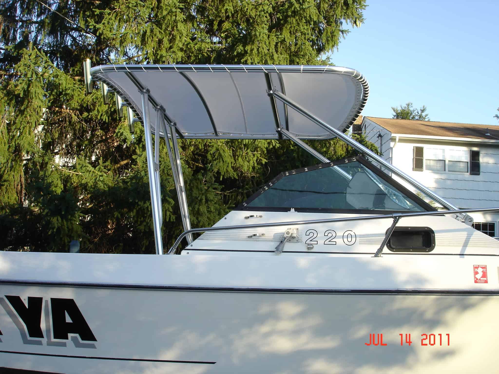 Atlantic Towers Top installed on an IMP 23 Sportsman walkaround boat, showcasing its sleek design and functionality.