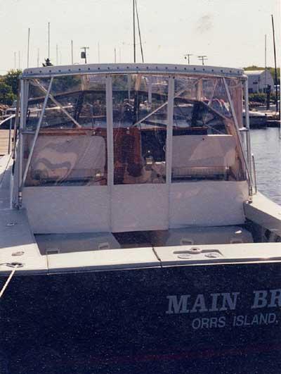 Atlantic Towers Top installed on a Rampage 28 Sportsman boat, showcasing the rear view of the vessel.