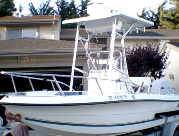 Atlantic Towers T-Top installed on a Sea Pro 180 center console boat, providing shade and support for fishing.