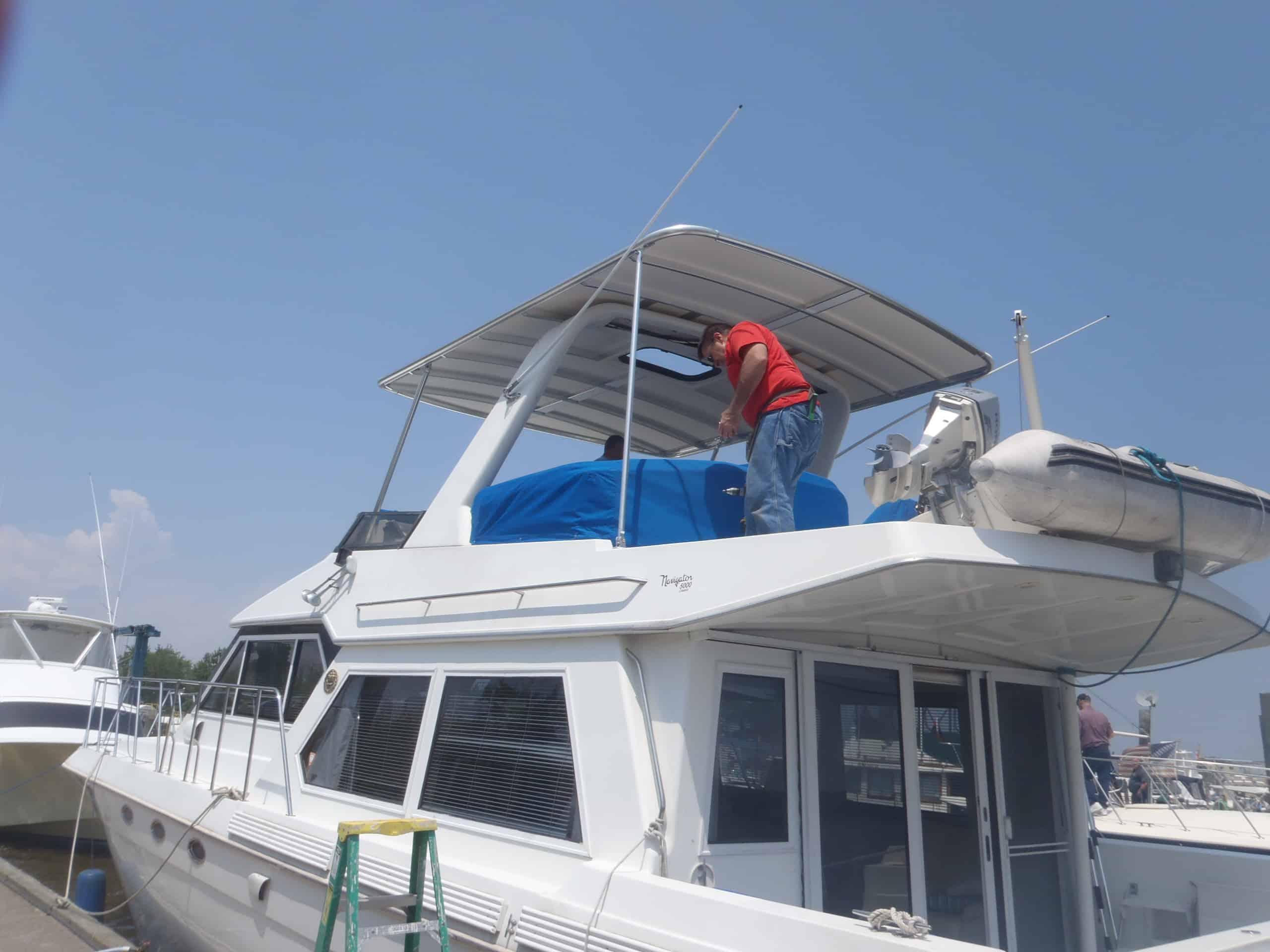 Atlantic Towers Top installed on Navigator 50 Classic pilot house boat, showcasing its sleek design and functionality.